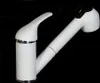 A white kitchen faucet with a pull-out spray head is shown against a black background. Produktbild-Vorschau