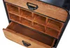 A close-up view of a wooden and metal cabinet with an open drawer and a shelf with compartments. Podgląd zdjęcia produktu