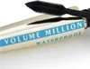 Close-up of a mascara tube with the brush extended. Produktbild-Vorschau