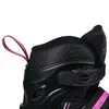 A close-up view of the top part of a black and pink inline skate. Anteprima dell’immagine prodotto