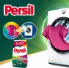 A marketing image for Persil laundry detergent, showing a pink t-shirt being washed in a washing machine. Náhled obrázku produktu