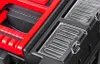 A close-up view of a black and red tool box with clear compartments. Náhľad obrázku produktu