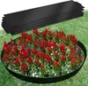 A stack of black metal garden edging panels is shown above a circular flower bed bordered by a black edging, filled with red and white flowers.