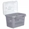 A gray plastic pet carrier with a white lid is shown against a white background. Náhľad obrázku produktu