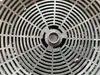 A close-up, overhead view of a circular metal grate with a radial pattern. Produktbild-Vorschau
