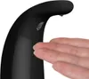 A hand is being placed under an automatic soap dispenser to receive soap. Náhled obrázku produktu