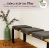A bench cushion is displayed in a hallway setting with a vase of greenery. Anteprima dell’immagine prodotto