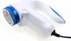 A close-up studio shot of a fabric shaver on a white background. Podgląd zdjęcia produktu