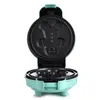 An open, teal-colored gingerbread man waffle maker against a white background. Náhled obrázku produktu
