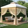 A gazebo with furniture and sheer curtains set up in a garden. Náhled obrázku produktu