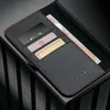 A close-up shot of a black leather phone case with red stitching, showing card slots and a banknote. Voir les images du produit