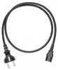 A black power cable with two different types of plugs on each end, laid out in a circular shape against a white background. Náhled obrázku produktu