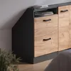 A close-up view of a modern dresser with two drawers, showcasing its wood grain texture and dark handles, set against a neutral wall. Voir les images du produit