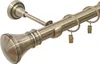 A close-up view of a metal curtain rod with rings and clips, in an antique gold finish. Produktbild-Vorschau