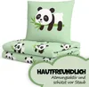 A stack of folded bedding with a pillow on top, all featuring a panda and bamboo print. A green cloud-like overlay with text is in the bottom right corner. Produktbild-Vorschau