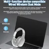 A pair of silver headphones is placed on an open laptop, with text describing the product's features. Náhľad obrázku produktu