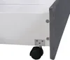 A close-up view of the bottom corner of a bed frame, showing a caster wheel and metal bracket. Anteprima dell’immagine prodotto