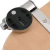 A close-up view of a toilet seat hinge mechanism attached to a wooden toilet seat. Podgląd zdjęcia produktu