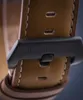 A close-up shot of a watch strap with the Timberland logo. Náhled obrázku produktu