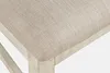 Close-up of a chair seat with textured fabric and a wooden frame. Produktbild-Vorschau