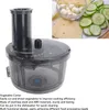 A food processor attachment is shown next to sliced cucumbers, cheese, and small balls of cheese. Produktbild-Vorschau
