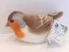 A plush toy robin with a tag attached. Náhled obrázku produktu