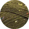 Close-up of green yarn with flecks of other colors. Produktbild-Vorschau