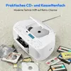 A white Medion radiorecorder with CD player and cassette deck is shown on a carpeted surface, surrounded by CDs and cassette tapes. Produktbild-Vorschau