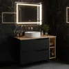A modern bathroom vanity with a sink and mirror against a black marble wall. Anteprima dell’immagine prodotto