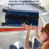 A woman is placing a blue suitcase into the overhead compartment of an airplane. Náhľad obrázku produktu
