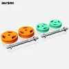 A set of dumbbells and weight plates on a white background. Produktbild-Vorschau