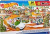 A Hot Wheels advent calendar box depicting a festive winter village scene with toy cars on a race track. Produktbild-Vorschau