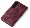 A burgundy flip case for a smartphone is shown at an angle against a white background. Produktbild-Vorschau