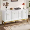 A white sideboard with gold legs and handles, decorated with a vase of dried flowers, a bowl of fruit, and a record player. Anteprima dell’immagine prodotto