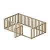 A wooden baby bed with a gate, shown on a white background. Produktbild-Vorschau