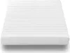 A white mattress with horizontal lines is shown from a side angle. Produktbild-Vorschau