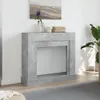 A modern fireplace surround in a room setting. Podgląd zdjęcia produktu
