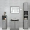 A bathroom vanity set with a sink, mirror, and storage cabinets against a tiled wall. Produktbild-Vorschau