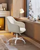 A cozy home office setup with a fireplace, desk, and chair. Produktbild-Vorschau