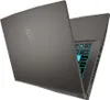 A gray MSI gaming laptop with its lid open, showing the illuminated keyboard. Produktbild-Vorschau