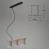 A pendant light with three fabric shades and a wooden bar, shown against a plain background with a technical drawing showing dimensions. Produktbild-Vorschau