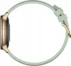 A side view of a smartwatch with a gold casing and a light green strap. Voir les images du produit