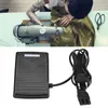 A person is sewing with a sewing machine, and the image also shows a foot pedal and cord. Náhľad obrázku produktu