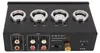 The back panel of a black electronic device, likely a phono preamplifier, is shown with various input and output connectors, regulatory markings, and branding. Podgląd zdjęcia produktu
