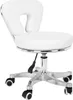 A white cosmetic stool with a headrest and wheels, shown from a side angle on a white background. Náhled obrázku produktu