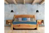 A bedroom scene with a wooden bed, nightstands, and pendant lights. Anteprima dell’immagine prodotto