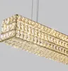 A close-up view of a rectangular crystal chandelier. Náhľad obrázku produktu