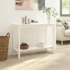 A white console table with decorative items and books on it, placed in a room with a sofa and a basket. Produktbild-Vorschau