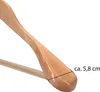Close-up of a wooden clothes hanger with a measurement indicator. Produktbild-Vorschau
