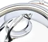 A close-up view of a pot lid handle and part of the pot rim. Produktbild-Vorschau